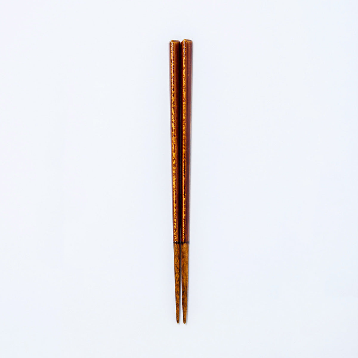 落ち着きのある飴色の三角箸